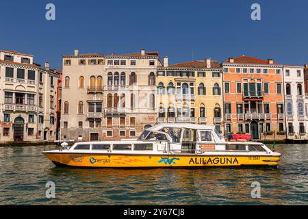 An Alilaguna boat on The Grand Canal in Venice  a transportation company which provides transport from the airport and lagoon area  in Venice, Italy, Stock Photo