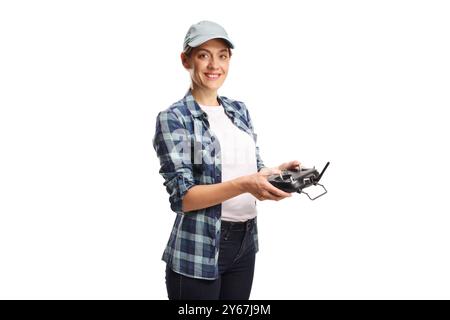 Young female farmer flying a drone, smart farming and advanced technology concept isolated on white background Stock Photo