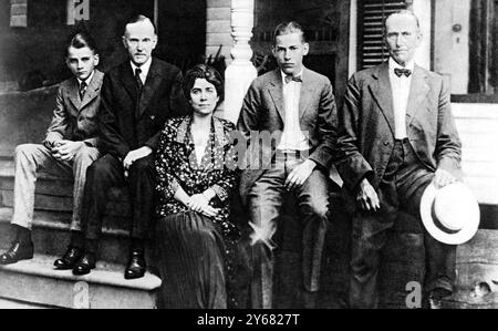 The new president of the United States and his family: (L to R) Mr Calvin Coolidge, Jr., Presidnet Coolidge, Mrs Calvin Coolidge, Mr John Coolidge, and Mr John C. Coolidge, The presidents father, who administrated the oath of office in the house before which the group was taken. 18 August 1923 Stock Photo