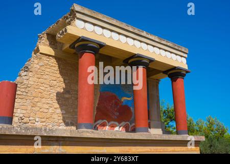 Mediterranean ancient ruins, view of the remains of a structure containing a wall painting of a bull in the ancient Minoan Palace of Knossos, Crete. Stock Photo