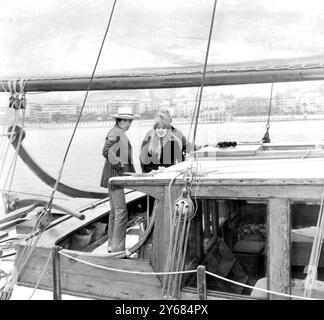 San Reno, Italy: Rolling Stones singer Mick Jagger seen January 28 with friend, pop star Marianne Faithfull leaving by yacht after Marianne's elimination from the San Reno Song Festival. 30th January 1967 Stock Photo