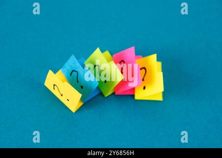 Question marks on colorful folders Stock Photo