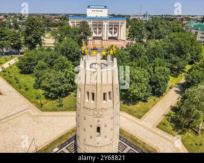 The aerial view of 'The unity and concord' monument at Maykop, Adygea, southern Russia, with the public park during the hot summer day. Stock Photo