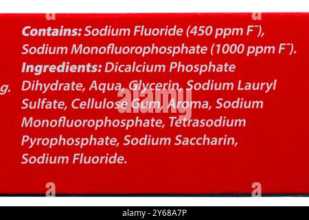 Toothpaste ingredients listed on box of  new look Colgate Cavity Protection toothpaste fluoride toothpaste Stock Photo