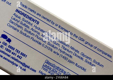 Toothpaste ingredients listed on box of Sensodyne Mild Mint toothpaste Stock Photo