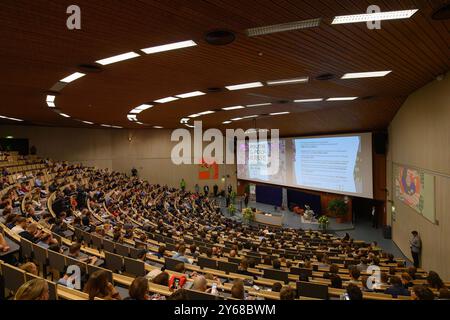 24 September 2024, Lower Saxony, Göttingen: Participants sit in a lecture hall at the opening of the 29th DVPW Congress at Georg-August-Universität Göttingen. The congress of the German Political Science Association (DVPW) is being held under the motto "Politics in the Polycrisis" and runs until September 27, 2024. Photo: Swen Pförtner/dpa Stock Photo