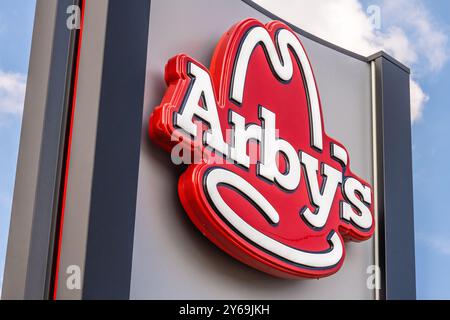 Highway sign for Arby's roast beef restaurant along Atlanta Highway in Loganville, Georgia. (USA) Stock Photo