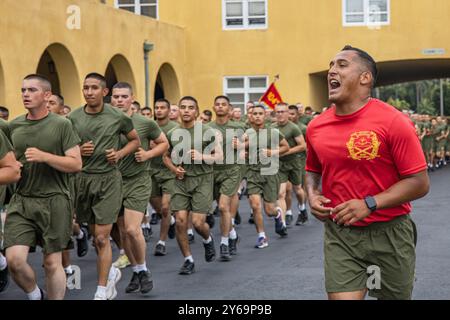 September 12, 2024 - Marine Corps Recruit Depot San D, California, USA - New U.S. Marines with Charlie Company, 1st Recruit Training Battalion, conduct their motivational run at Marine Corps Recruit Depot San Diego, California, September. 12, 2024. The company motivational run is a three-mile cadence run conducted around the Depot and is the last physical training event the Marines will conduct before the graduate from MCRD San Diego. The event is also the first time friends and families will see their newly transformed Marines. (Credit Image: © Sarah Grawcock/U.S. Marines/ZUMA Press Wire) EDI Stock Photo