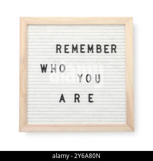 Letter board with phrase Remember who you are on white background, top view Stock Photo