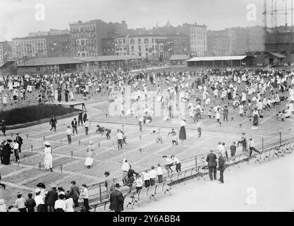 Children planting in Thos. Jefferson Park, N.Y.C., Photograph shows children in the farm garden which opened on May 20, 1911 and was designed as a place of respite for child laborers in Thomas Jefferson Park, New York City., between ca. 1910 and ca. 1915, N.Y.C, Children, Glass negatives, 1 negative: glass; 5 x 7 in. or smaller. Stock Photo