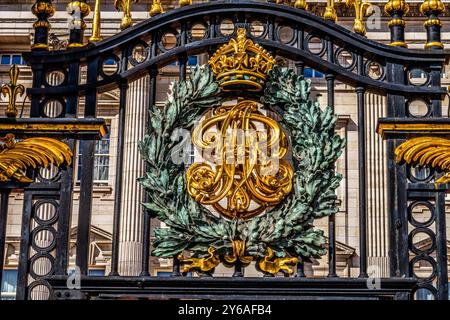 Royal Sovereign Coat of Arms Gate Buckingham Palace Westminster London England. Coat of Arms for Sovereign. Buckingham Palace London Residence and Adm Stock Photo