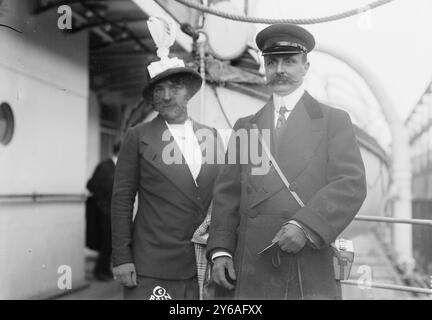 Bleriot & wife, Photo shows French aviator Louis Bléeriot (1872-1936) and his wife who were part of a French delegation sent to the unveiling of a Rodin bust of Samuel Champlain at the Champlain Memorial Lighthouse in Crown Point, New York., 1912, Glass negatives, 1 negative: glass; 5 x 7 in. or smaller. Stock Photo