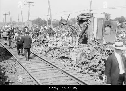 Wreck of Bar Harbor express, Photograph shows people looking at wrecked railroad cars after a railroad accident in which the White Mountain Express crashed through two cars of the Bar Harbor Express, north of New Haven, Connecticut on Sept. 2, 1913., 1913 Sept. 2, Glass negatives, 1 negative: glass; 5 x 7 in. or smaller. Stock Photo