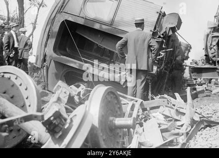 Wreck of car Chrisholm, Photograph shows people looking at wrecked railroad cars after a railroad accident in which the White Mountain Express crashed through two cars of the Bar Harbor Express, north of New Haven, Connecticut on Sept. 2, 1913., 1913 Sept. 2, Glass negatives, 1 negative: glass; 5 x 7 in. or smaller. Stock Photo