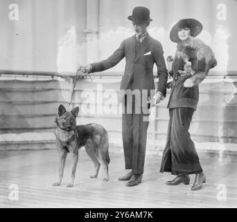 Vernon Castle and wife with pets, Photograph shows ballroom dancers Irene (Foote) Castle (1893-1969) and her husband, Vernon Castle (1887-1918)., between ca. 1910 and ca. 1915, Glass negatives, 1 negative: glass; 5 x 7 in. or smaller. Stock Photo