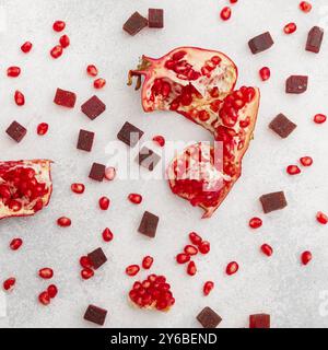 Homemade candied jelly with pomegranate fruits on table. Flat lay, top view. Stock Photo