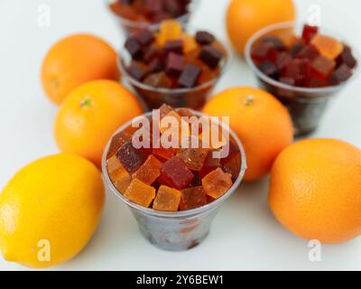 Citrus fruit jelly with orange fruits on table Stock Photo