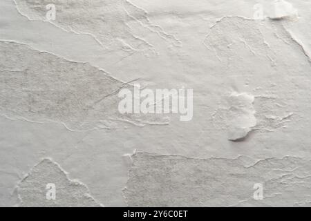 Peeled white paper texture background Stock Photo