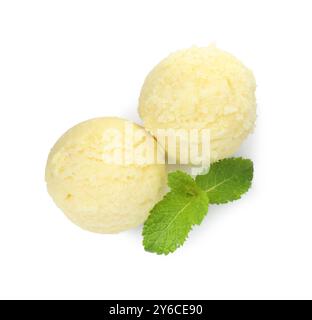 Scoops of melon sorbet and mint isolated on white, top view Stock Photo