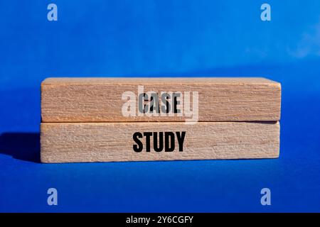 Case study message written on wooden blocks with blue background. Conceptual case study symbol. Copy space. Stock Photo