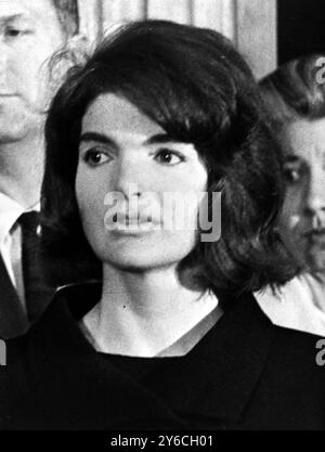 JACQUELINE JACKIE KENNEDY WITH CLINTON HILL C J GETS BRAVERY AWARD IN WASHINGTON  /  ;  10 DECEMBER 1963 Stock Photo