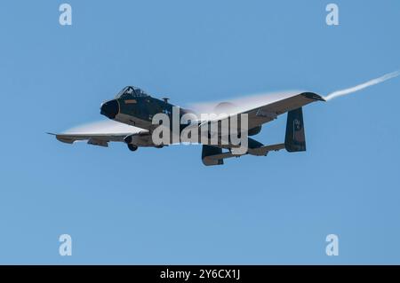 U.S. Air Force Maj. Lindsay “MAD” Johnson, A-10C Thunderbolt II Demonstration Team commander and pilot, completes a simulated attack strafe during the Stock Photo