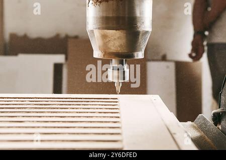 CNC router machine creates a layout of the shelf complex. Stock Photo