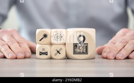 Wooden blocks with symbol of gps concept Stock Photo