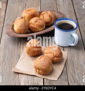 Broa, typical brazilian corn flour bread with coffee. Stock Photo