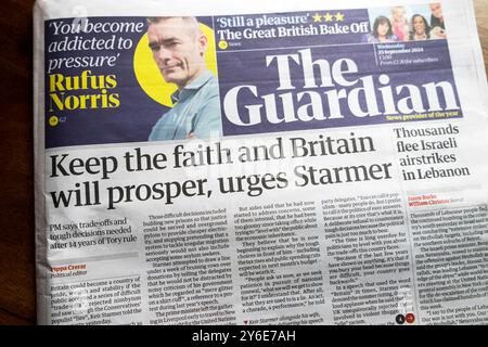 'Keep the faith and Britain will prosper, urges (PM Keir) Starmer' Guardian newspaper headline front page article 25 September 2024 London England UK Stock Photo