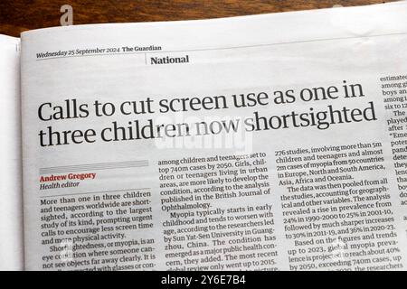 'Calls to cut screen use as one in three children now shortsighted' Guardian newspaper headline myopia article 25 September 2024 London England UK Stock Photo