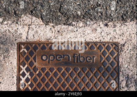 Iron access cover for fiber optic cables Stock Photo