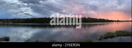 Cloudy Sunset Over an Lake Olathe Kansas Public Park Stock Photo