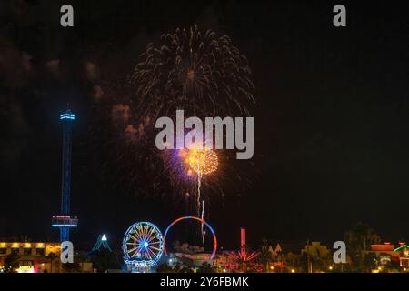 Kemah, Texas, USA - June 21, 2024: Summertime every Friday night fireworks at Kemah Boardwalk. Stock Photo