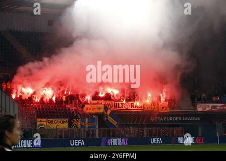 ALKMAAR - Supporters of IF Elfsborg set off fireworks during the UEFA Europa League match between AZ Alkmaar and IF Elfsborg at AFAS stadium on Sept. 25, 2024 in Alkmaar, Netherlands. ANP BART STOUTJESDIJK Stock Photo