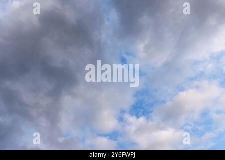 Grey stratocumulus clouds covering blue sky, Finland Stock Photo
