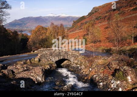 Skiddaw from Ashness Bridge over Barrow Beck in autumn, Lake District, UK Stock Photo