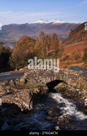 Skiddaw from Ashness Bridge over Barrow Beck in autumn, Lake District, UK Stock Photo