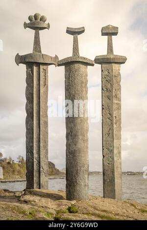 Hafrsfjord, Norway, May 2014: Swords in rock monument in Hafrsfjord, Norway, neighborhood of Madla, a borough city of Stavanger, created by Fritz Roed Stock Photo