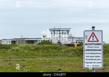 Airfield on the Helgoland dune, building, tower, warning sign, danger to life, offshore island of Helgoland, North Sea, Pinneberg district, Schleswig- Stock Photo