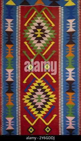 The fabric embroidered with multicolor ornaments, background Stock Photo