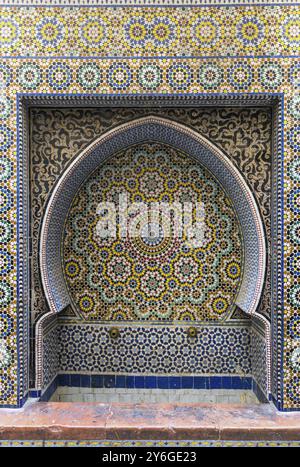 Traditional maroccan old fountain pattern tiled background Stock Photo