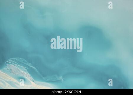 Blue ice abstract textured background with light in ice Stock Photo
