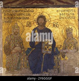 Jesus Christ is sitting on a throne decorated with jewels witn Empress Zoe and Emperor Constantine IX Monomachus, Hagia Sofia in Istanbul, Turkey, Asi Stock Photo