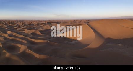 Beatiful aerial panorama landscape with big sand dunes in Sahara desert at sunrise Stock Photo