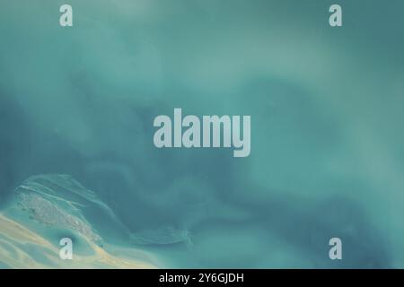 Blue ice abstract textured background with light in ice Stock Photo