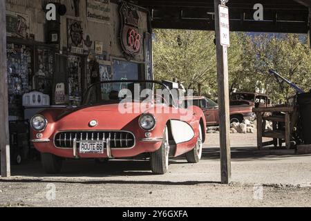 Hackberry, Arizona, United States, November 2013: old timer car fueling up in a vintage service and gas station on historic route 66, North America Stock Photo