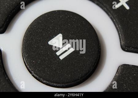 Play pause button on remote control, macro closeup Stock Photo