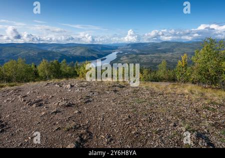 Evening overview of the Yukon River as seen from the Midnight Dome in Dawson City, Yukon, Canada Stock Photo