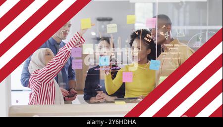 Team brainstorming with sticky notes over image of business strategy concepts Stock Photo